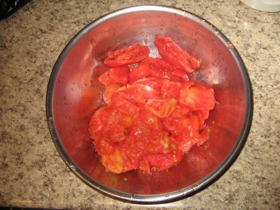 Just under 2.5 pounds of crushed tomatoes from a bit over 4 pounds of whole tomatoes