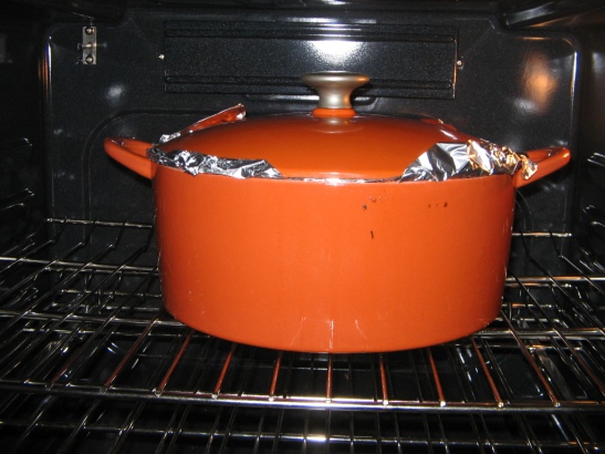 dutch oven with foil under lid